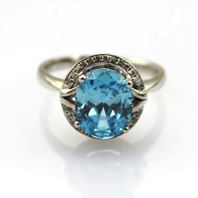 Sterling Silver 8mmx10mm Oval Blue Topaz Cubic Zircon Ring (R182)
