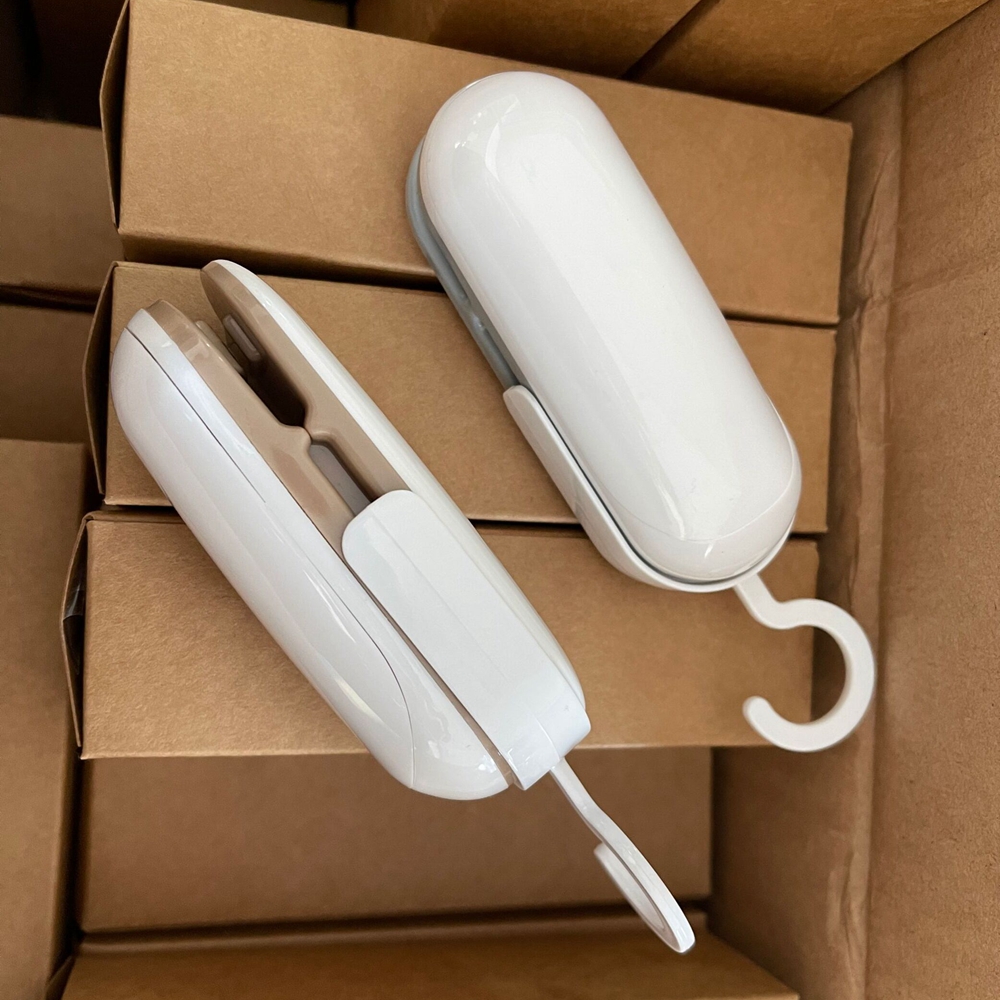 Plastic Pouch Sealing Mini Bag Sealer and Cutter for Portable Paper Packaging Material