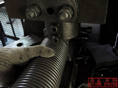 xulong spring supply various of custom-made spring steel roll-up door torsion spring 