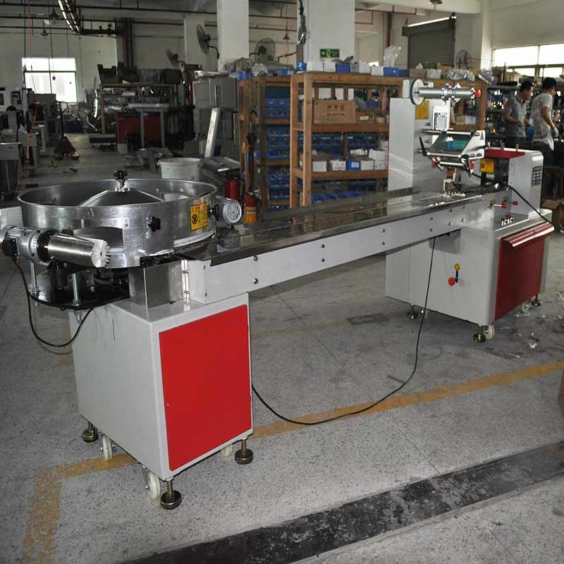 Special Treatment High Speed Hard Candy Feeding Forming Filling Sealing Automatic Packing Machinery