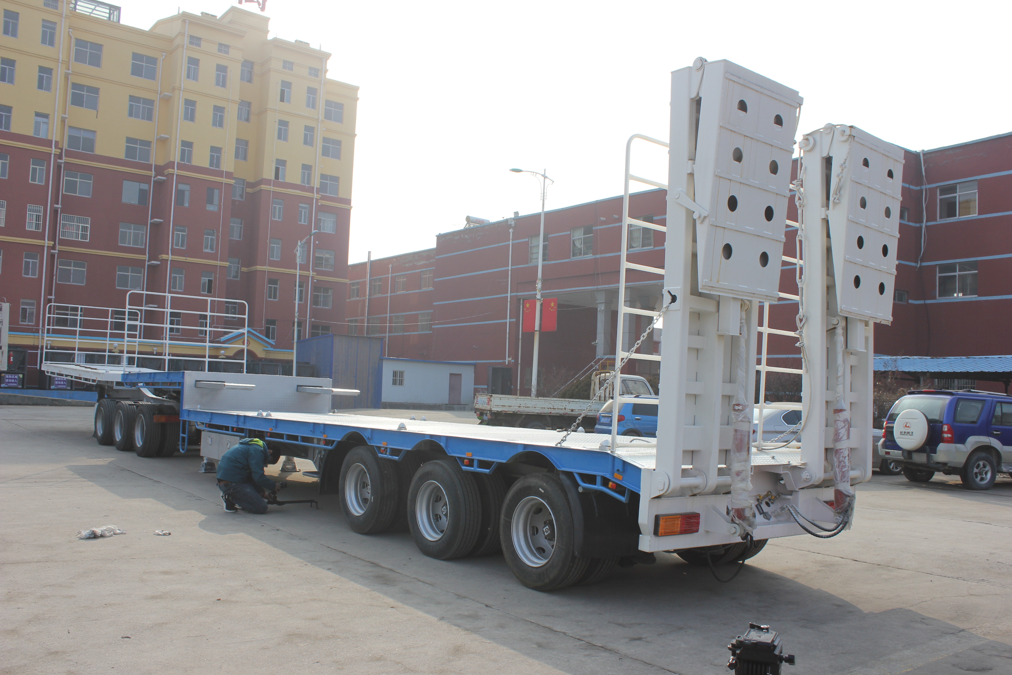 Standard 28T Landing Gear Inter Link Flatbed Semi Trailer with 80-120 Tons Rated Load