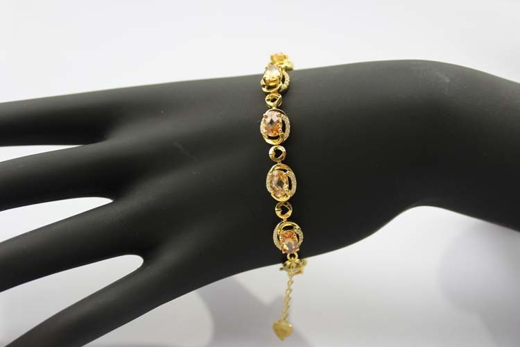 Gold Plated Silver with 5x7mm Oval Champagne Citrine and Clear Cubic Zircon Tennis Bracelet(B06CHAMPAGE)