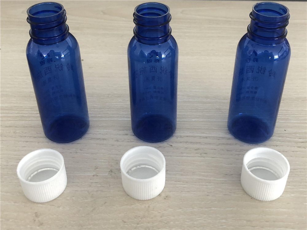 GMP 125ml Pharma Aseptic Rotary Bottle Filling Machine
