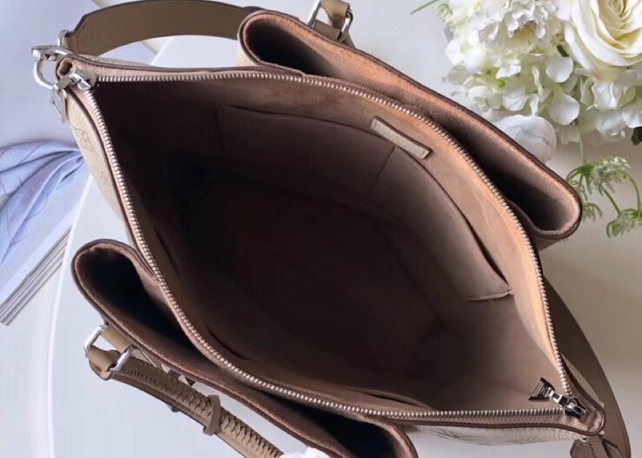 haumea Women fashion handbag genunie cowhide leather cross-body bag Weaving handle double spike pendant bag
