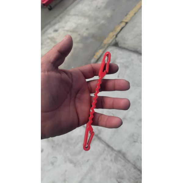 Red Plastic Support Clips That Go Between The Concertina Wire And The Wire