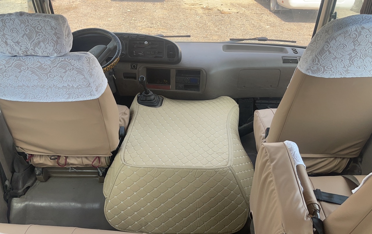 30 Seater Toyota Coaster Bus with Double Circuit Air Brake and High Speed of 69 Km/h