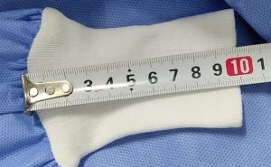 China Knitted Cuff Disposable Hospital Gowns , Surgical Gowns Hook Loop Fastener on sale