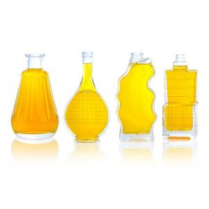 China Glass Products Unique Shaped Bottle 750ml 700ml for Vodka Whiskey Tequila Brandy on sale