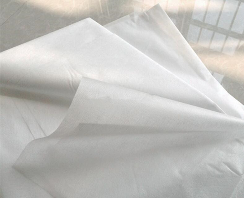 Dustproof 70*170cm 80*100cm Disposable Bed Cover Roll With Holes