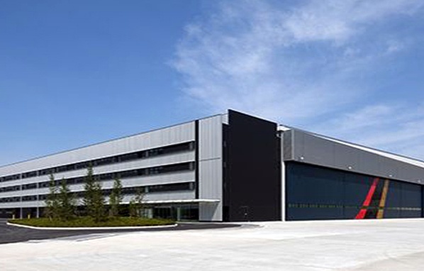 Q235B Q355B ASTM A36 Prefab Steel Frame Building For Warehouse Workshop Custom Design