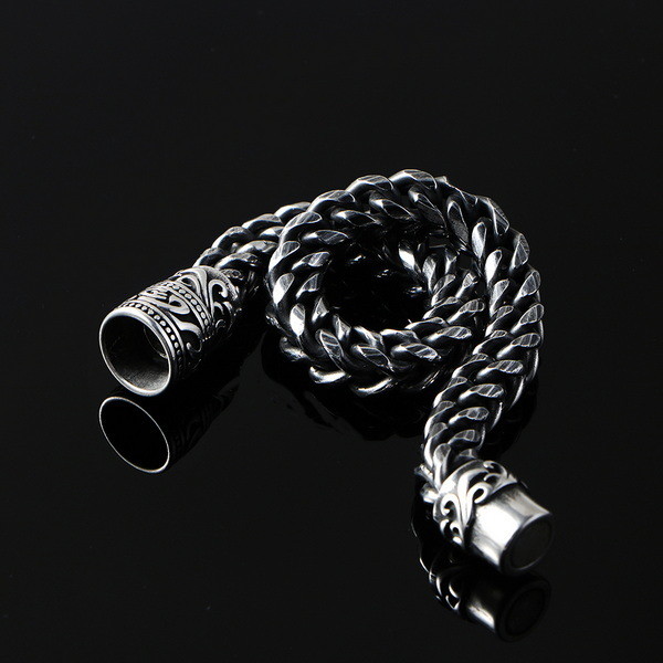 Stainless steel men's bracelet with retro patterned surface cast magnetic buckle design, trendy accessory