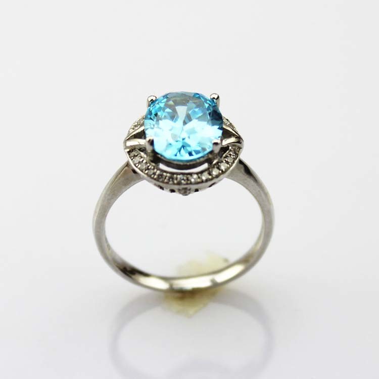 Sterling Silver 8mmx10mm Oval Blue Topaz Cubic Zircon Ring (R182)