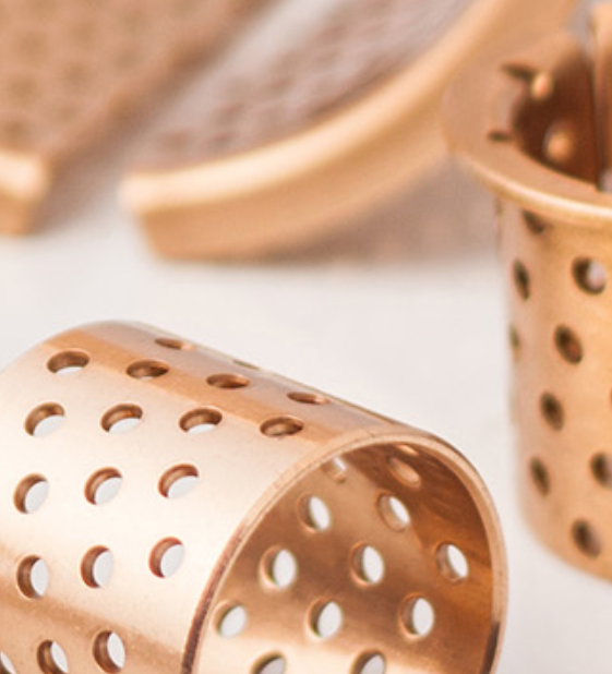 wrapped bronze bushing with through holes