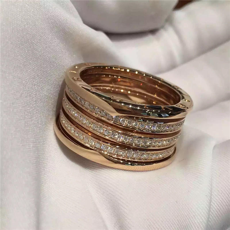 B.zero1 4-band ring in 18kt pink gold with pave diamonds AN857022