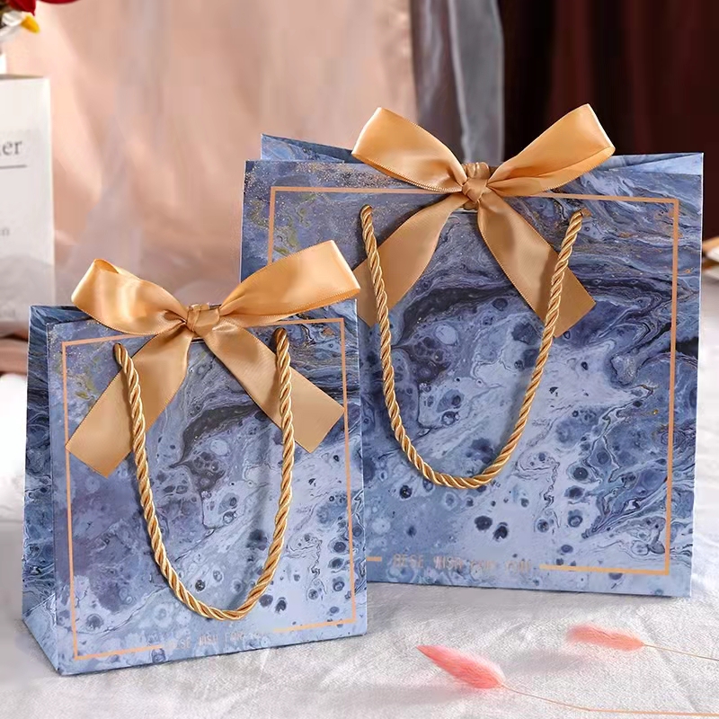 wholesale luxury foldable shopping bag custom logo black paper gift bag with ribbon