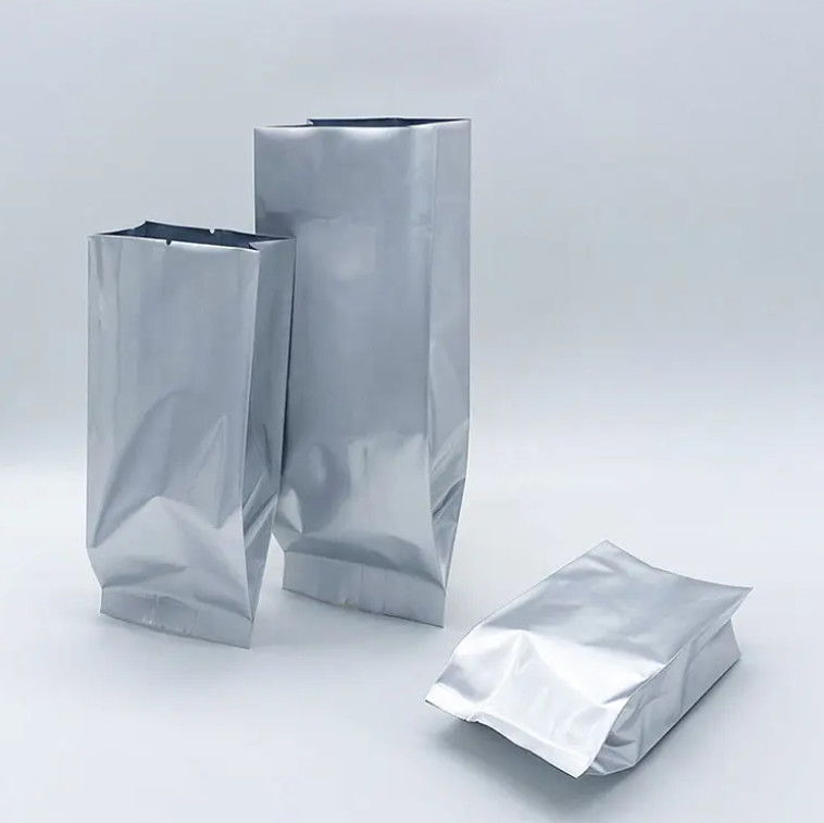 Glossy Silver Aluminum Foil Laminated Heat Seal Back Sealing Side Gusset Food Packaging Pouch Vacuum Food Tea Coffee Bean Bags