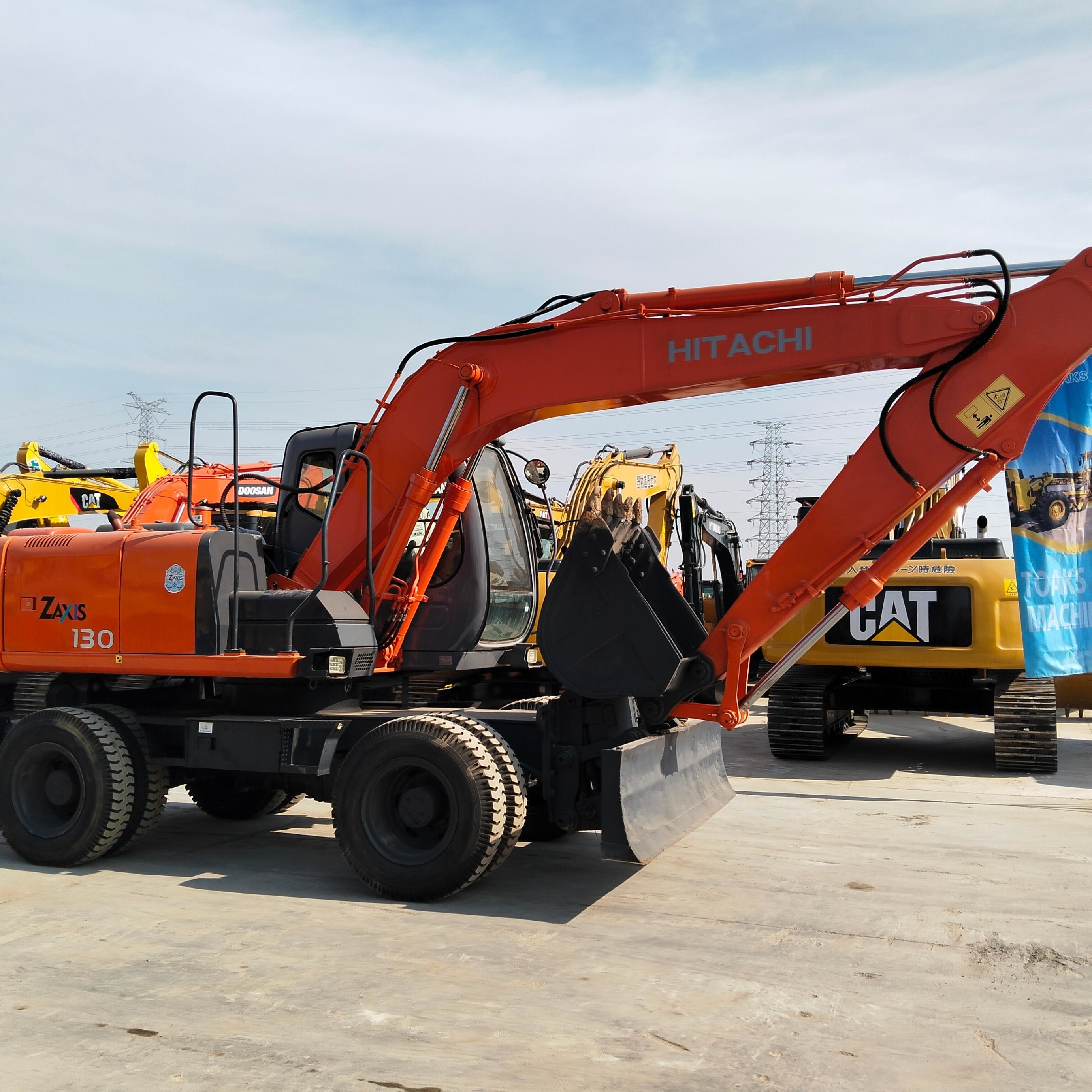 New Arrive Used Doosan Zx130W Wheel Excavator 0.6 M³ Bucket Capacity Secondhand Digger