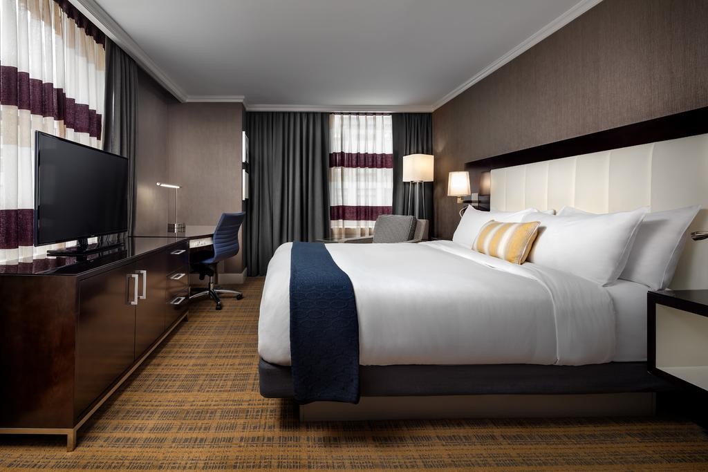 Hotel Standard Double Room Interior design of Furniture in Fabric upholstered headboard and Leather Bed with TV cabinet