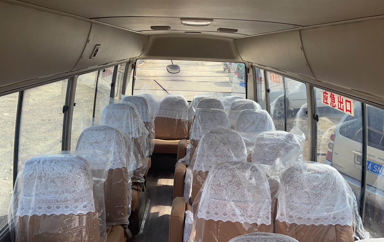 Toyota Coaster 24 Seats Small Bus with 7.00R16 Tires and Max Speed of 91-110 km/h
