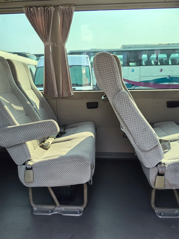 Toyota Coaster 20-Seat Electric Chinese-Door China IV Champagne Gold Medium-Sized Business Bus